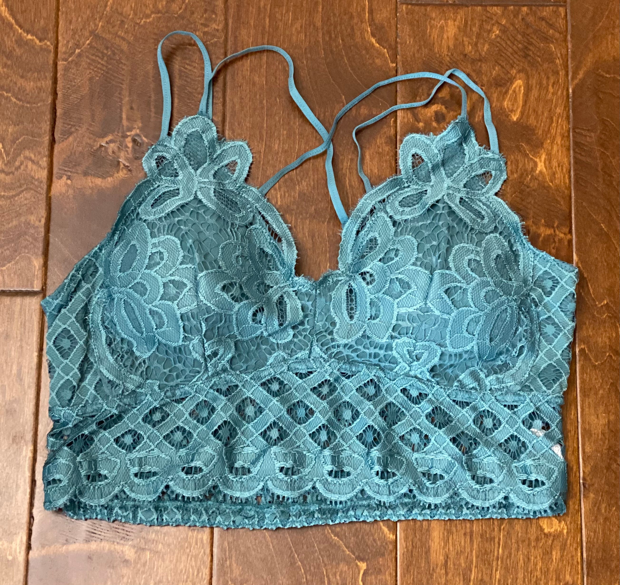 http://hometownheritageclothing.com/cdn/shop/products/Padded-Bralette-in-Teal-Plus-Size-by-Anemone.jpg?v=1645470400