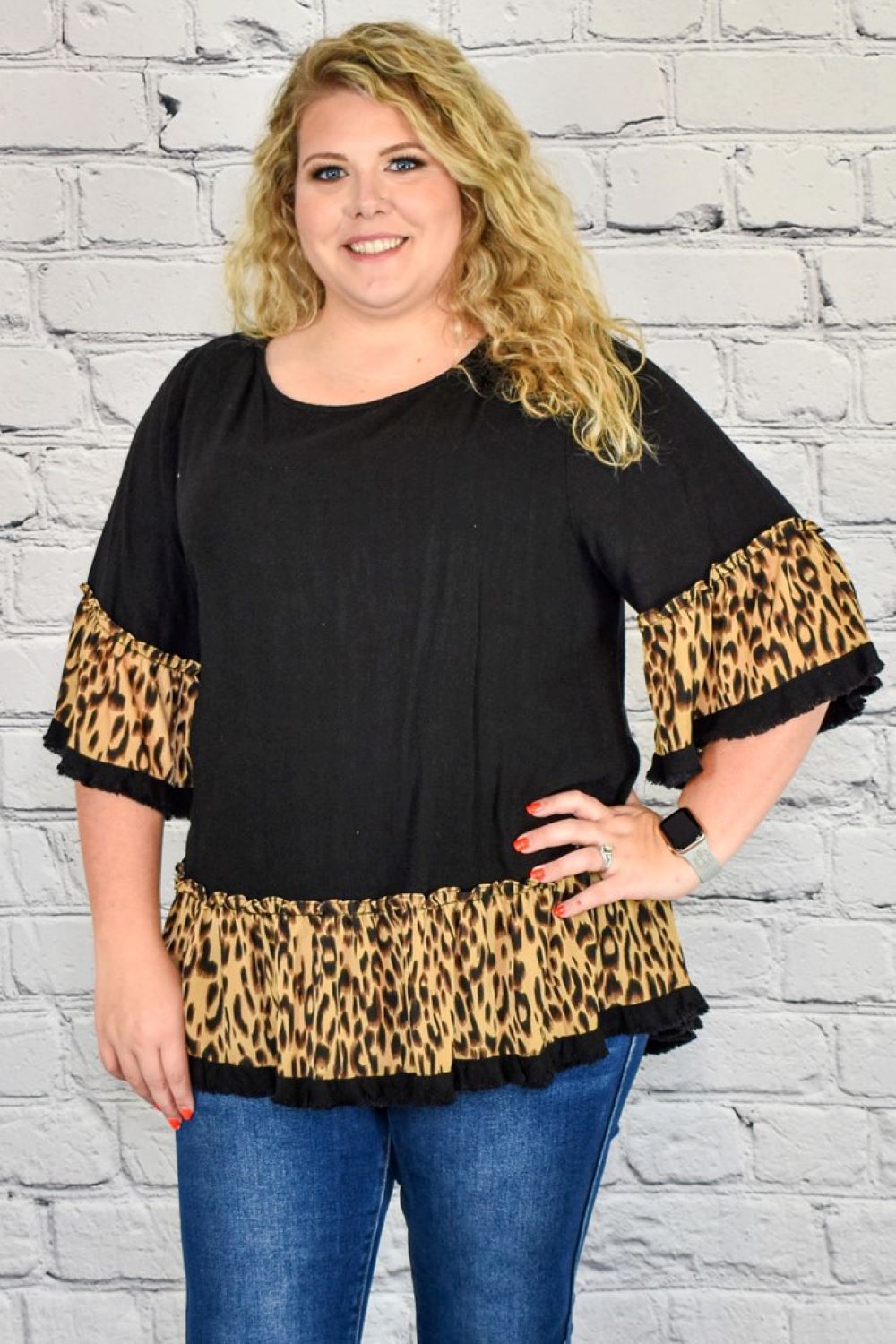Black Tunic Top with Animal Print Ruffle Trim in Plus Size by Umgee Clothing