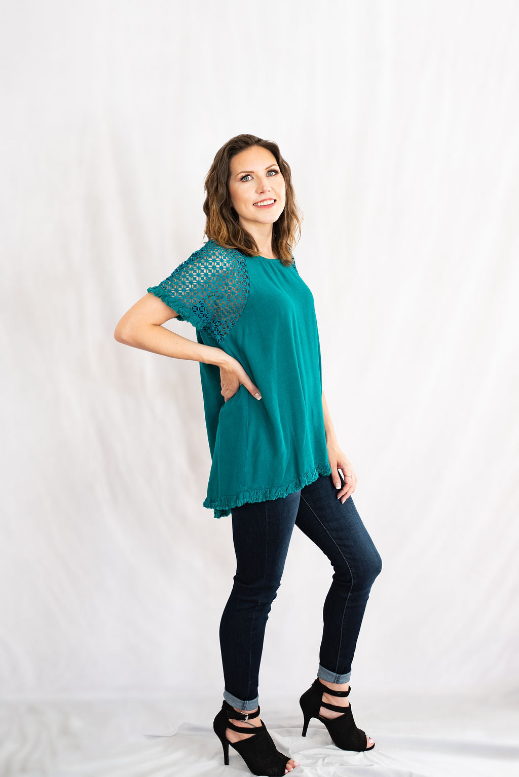 Frayed Hem Linen Tunic Top with Floral Crochet Sleeves by Umgee Clothing