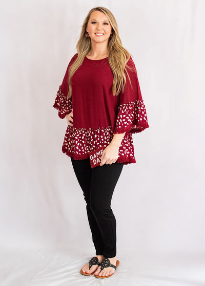 Linen Ruffled Hem Top with Animal Print Bell Sleeves by Umgee Clothing